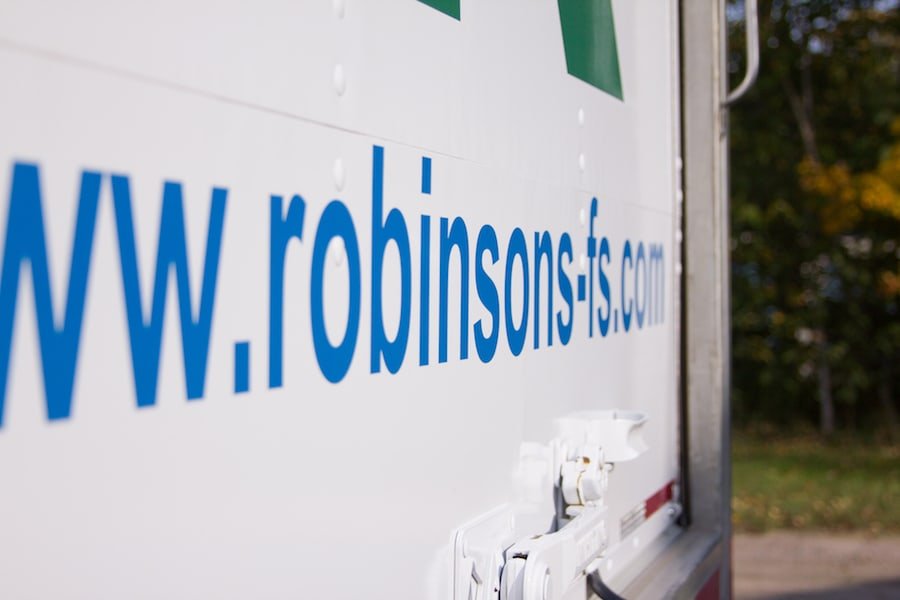 Close up of an industrial air filter cleaning truck with robinsons-fs.com printed on the back. 